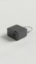 Salange projector top view with HDMI cable, Hero angle: 3/4 front with slight elevation, capturing both top surface and...
